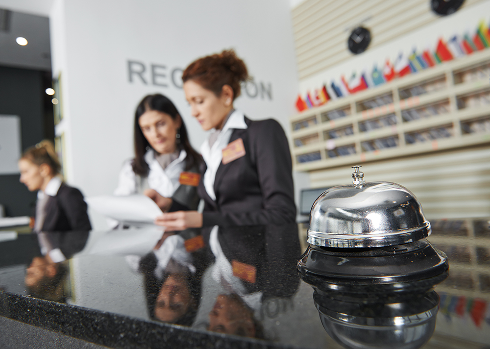 Modern luxury hotel reception counter desk with bell